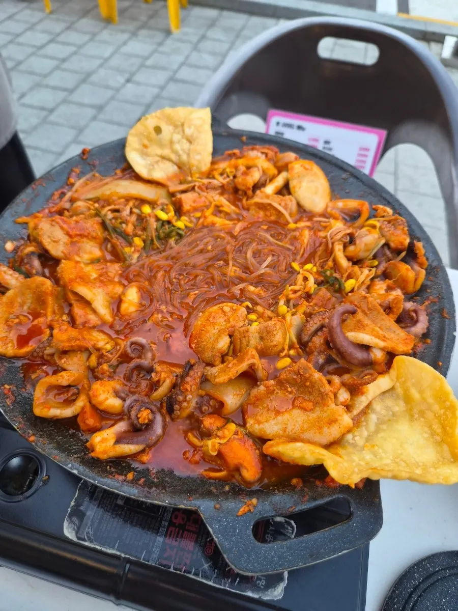 Jjuksam starting to cook on the pan