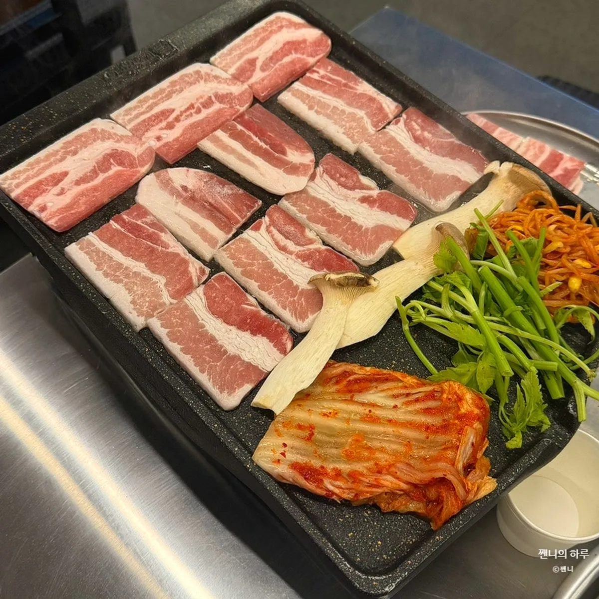 Three servings of frozen pork belly
