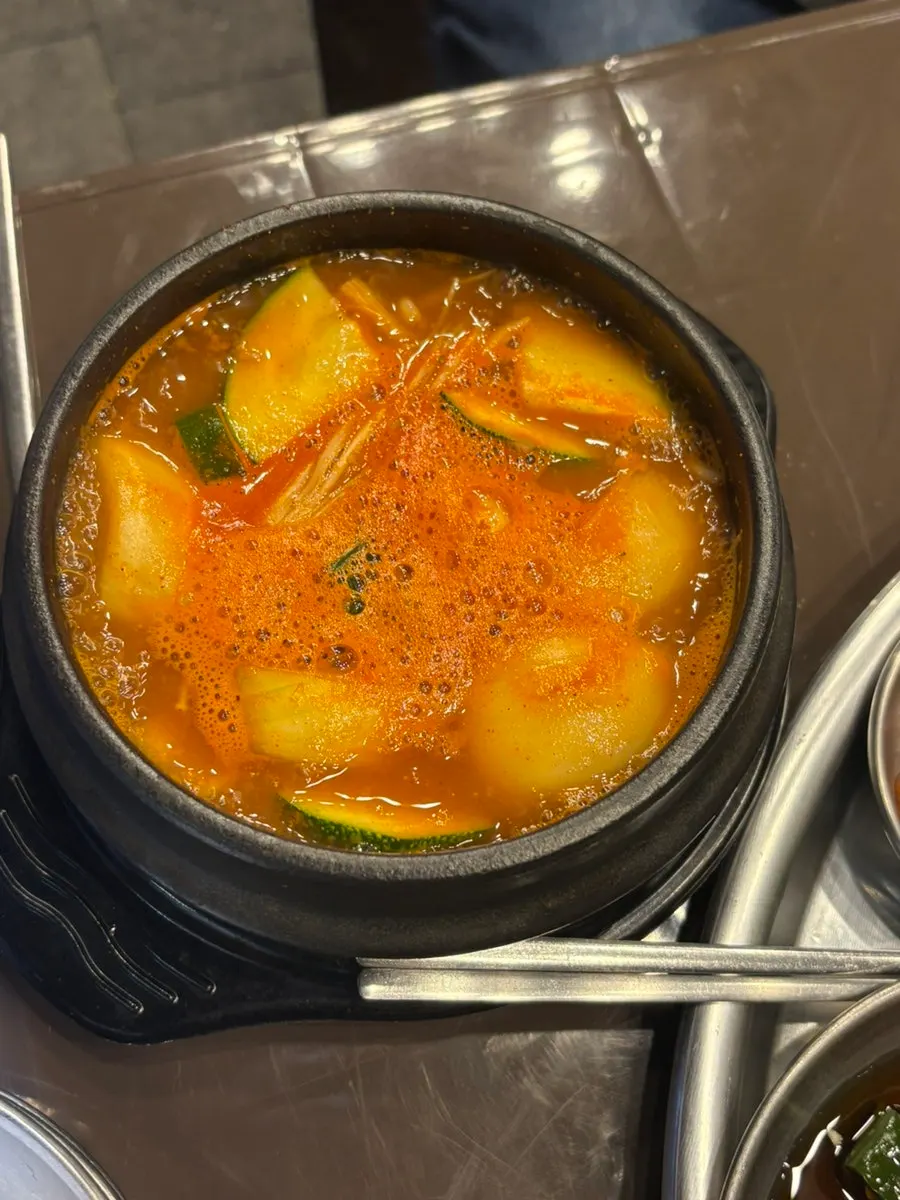 Naengsam starting to grill on the pan