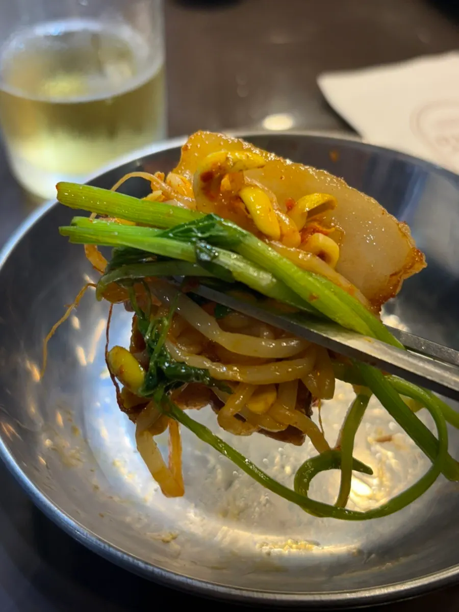 Frozen pork belly wrapped in kimchi