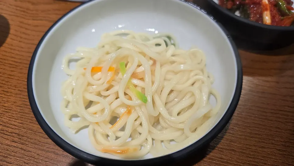Kalguksu noodles in seafood broth