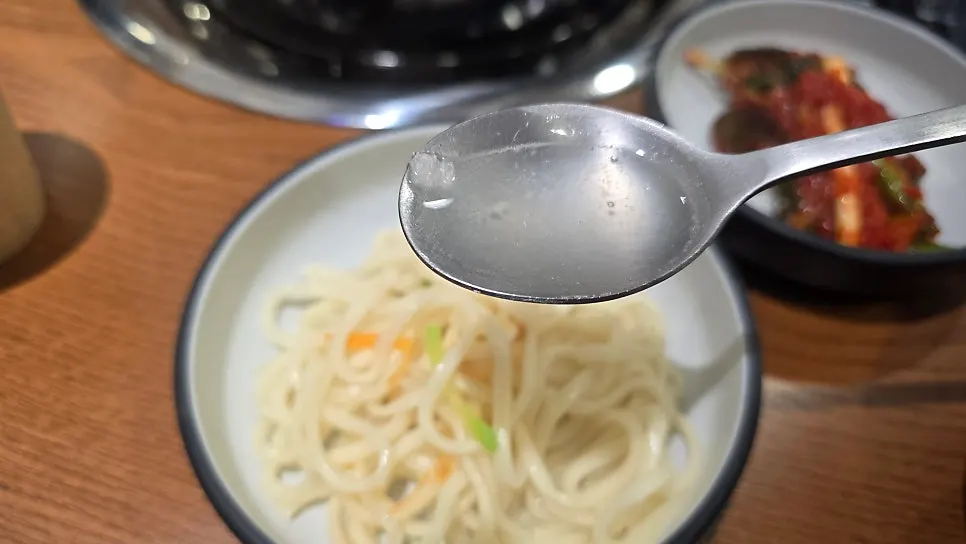 A full spread of bossam and kalguksu