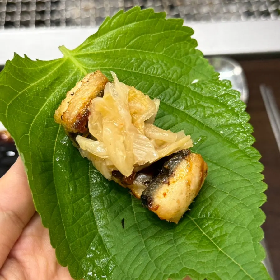 Eel wraps with pickled perilla leaves and aged kimchi