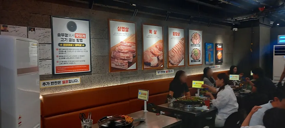 Sanggu's Sotttukkeong Samgyeopsal Gueui Branch bustling with customers