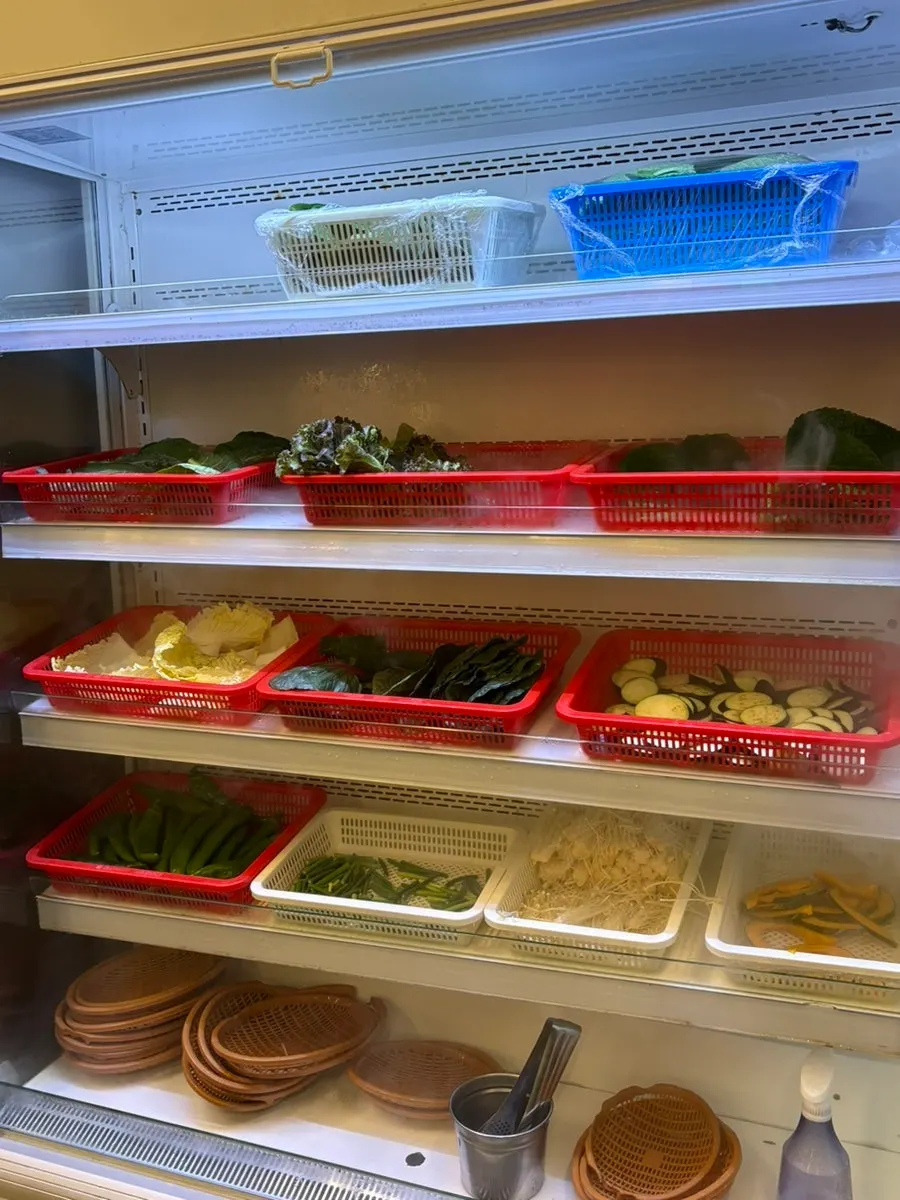 Unlimited self-serve bar stocked with wrap vegetables