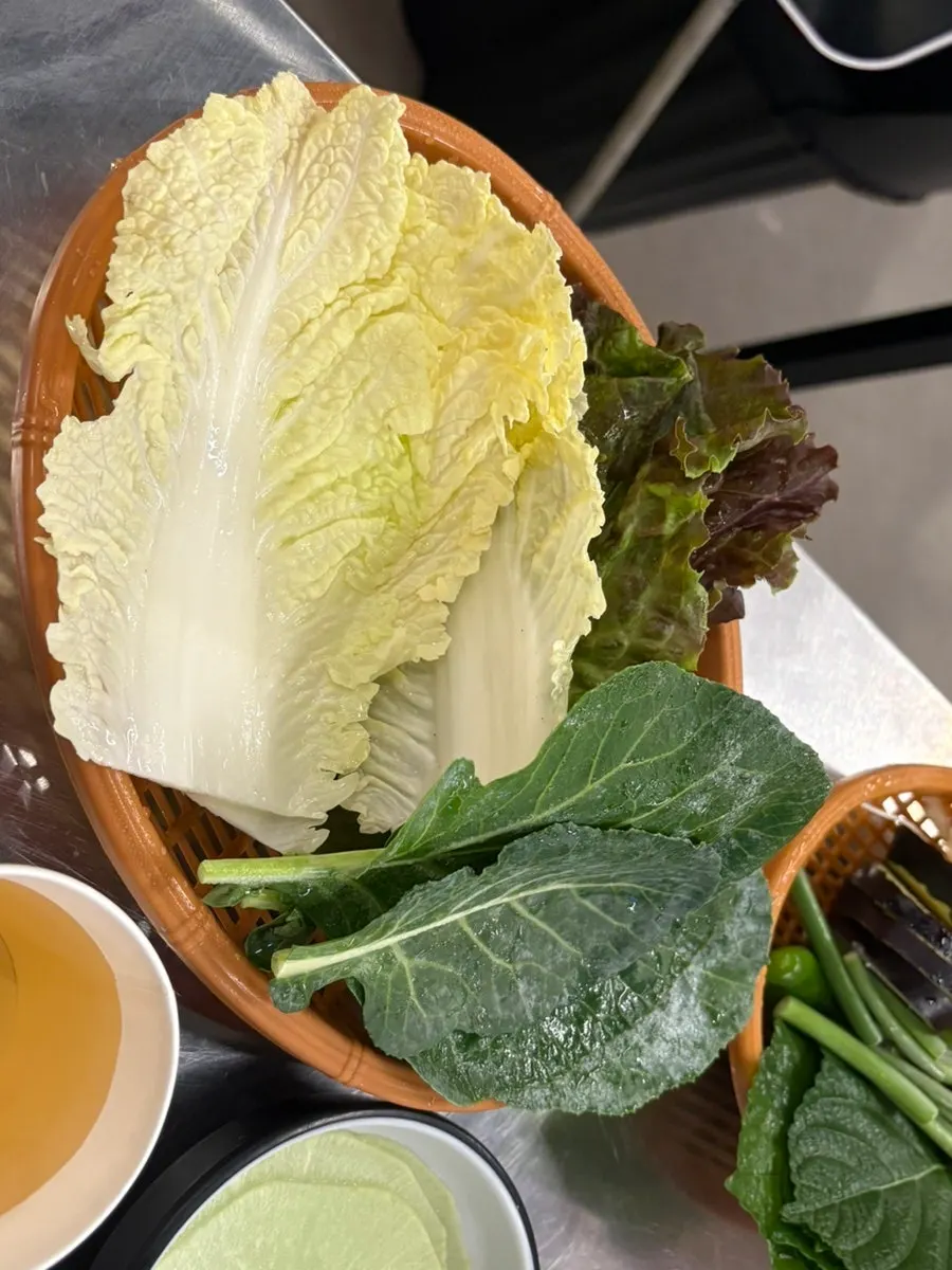 Plate of wrap vegetables picked up from the self-serve bar