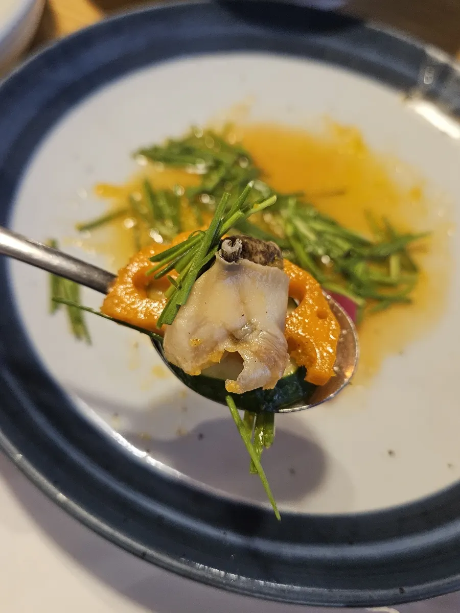 Close-up of the chilled whelk salad plate