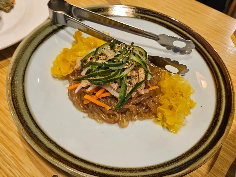 A plate of bossam pork and kimchi