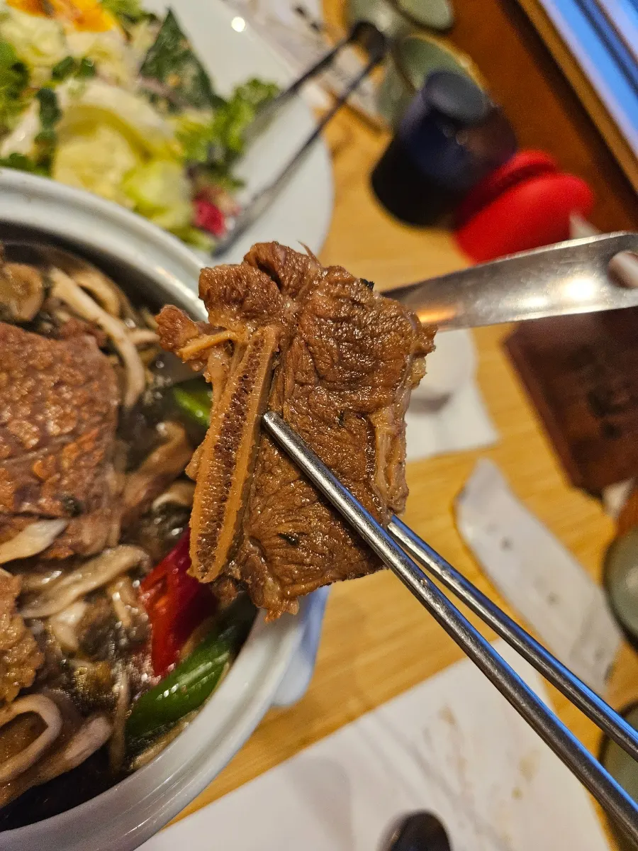 Warm mushroom braised short ribs served in a small bowl