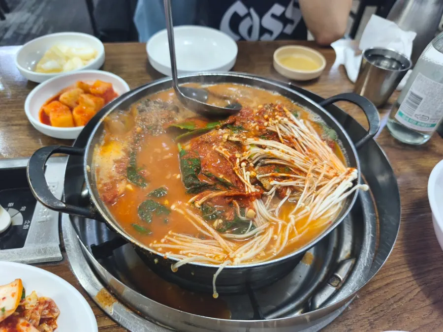 Red gamjatang broth starting to boil