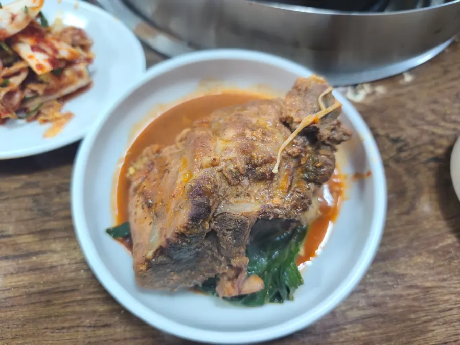 Gamjatang meat portioned onto a small plate