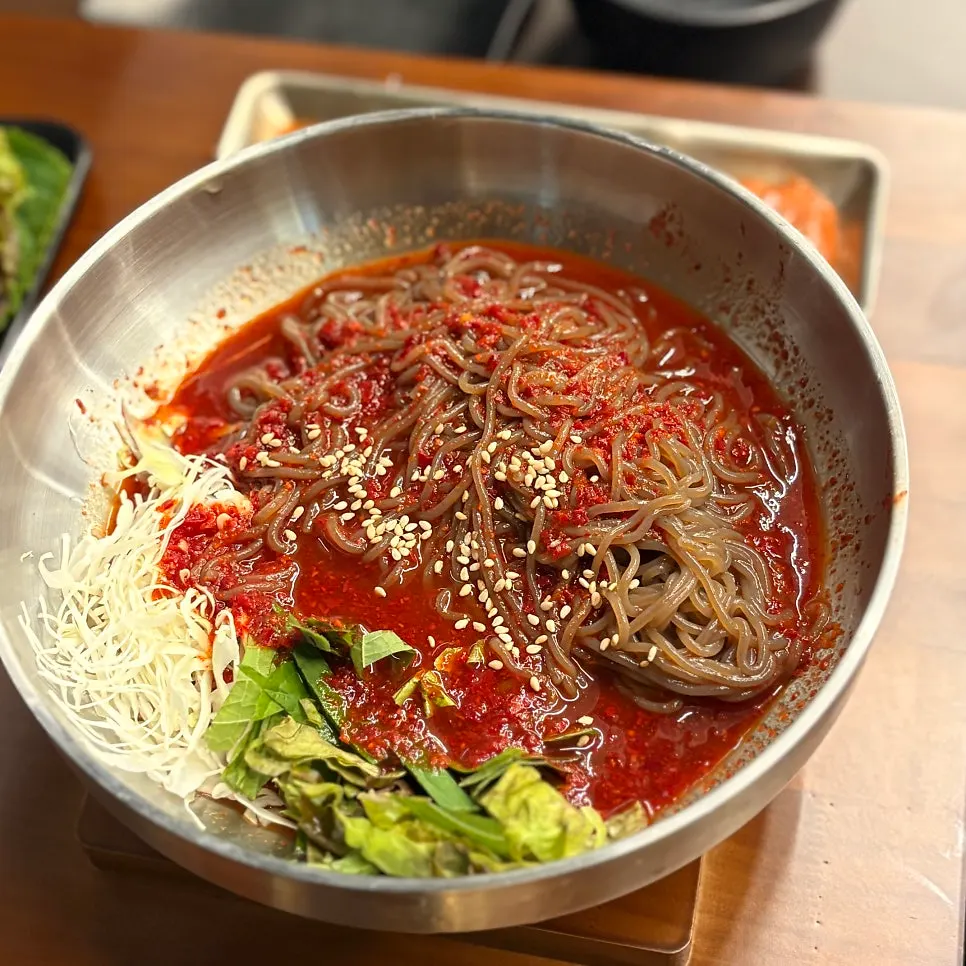 Free makguksu served as a complimentary dish