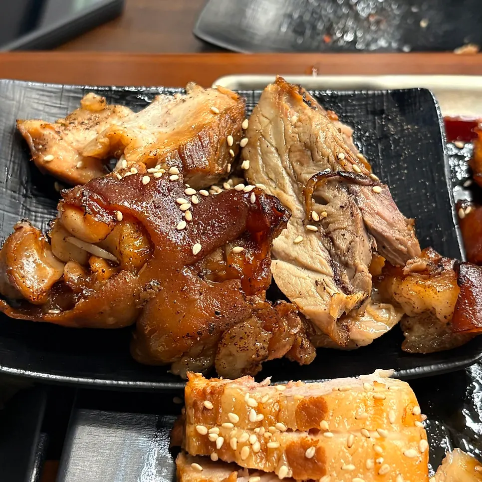 Complimentary salt-grilled jokbal barbecue