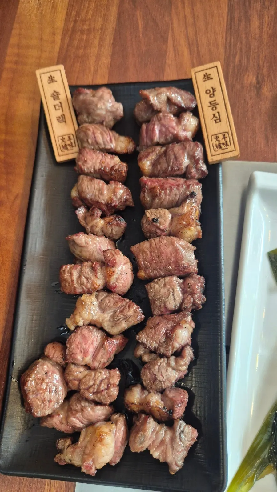 Lamb grilled by a staff member