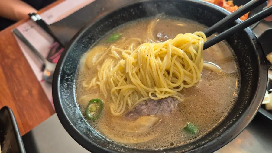 Spicy beef warm noodles ordered as an extra