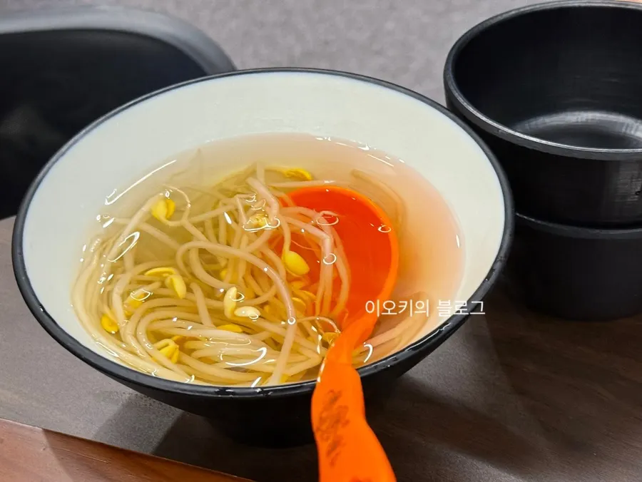 Complimentary spicy bean sprout soup