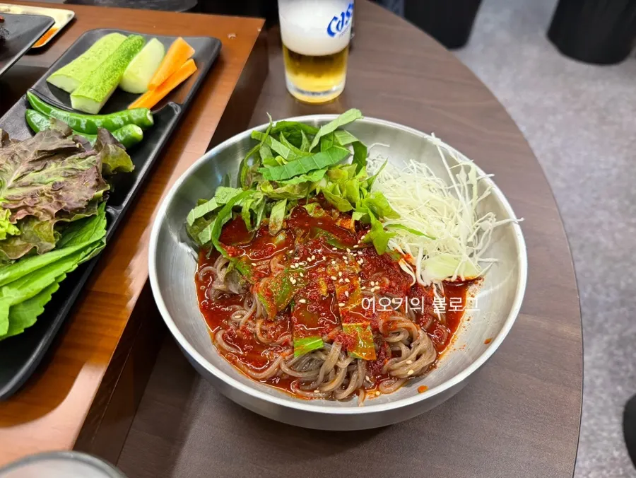 Complimentary makguksu served with a table order