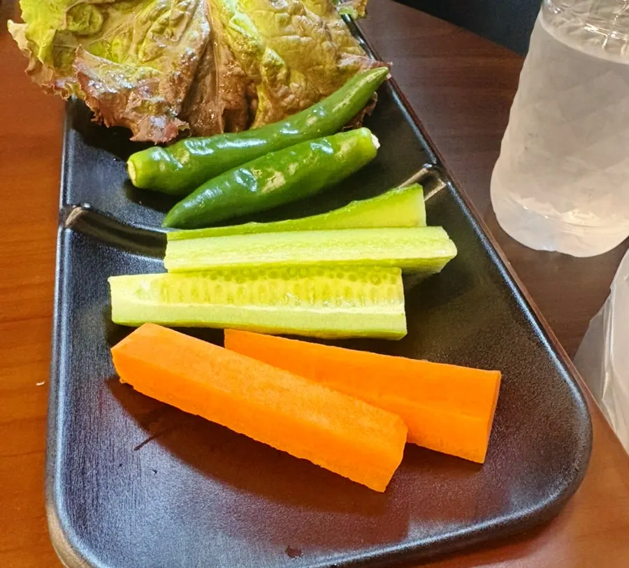Side dishes of kimchi, pickled radish and garlic