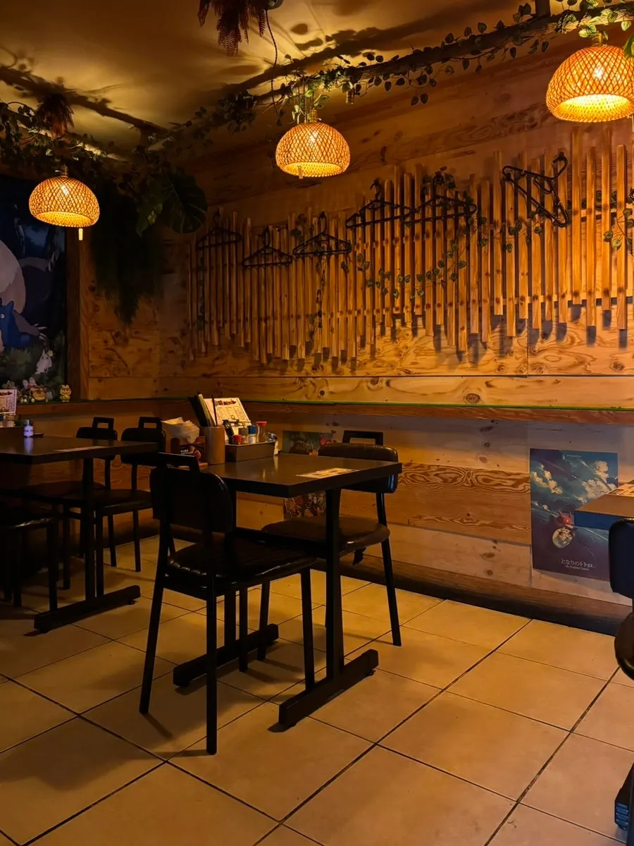 Japanese-style izakaya interior with doors wide open