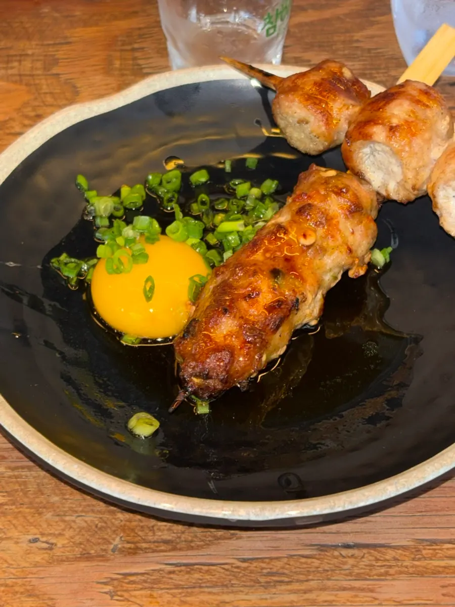 Close-up of the tsukune skewer on the plate
