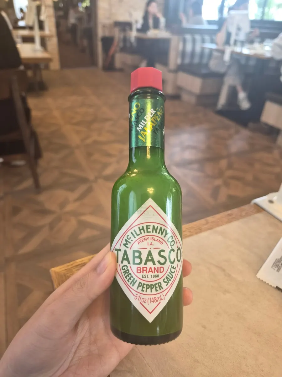 Green Tabasco served with pizza