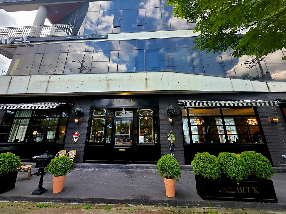 Bueokgan exterior with black walls and big windows