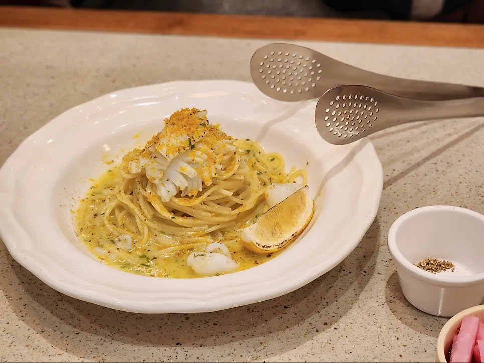 Cuttlefish oil pasta served onto a plate