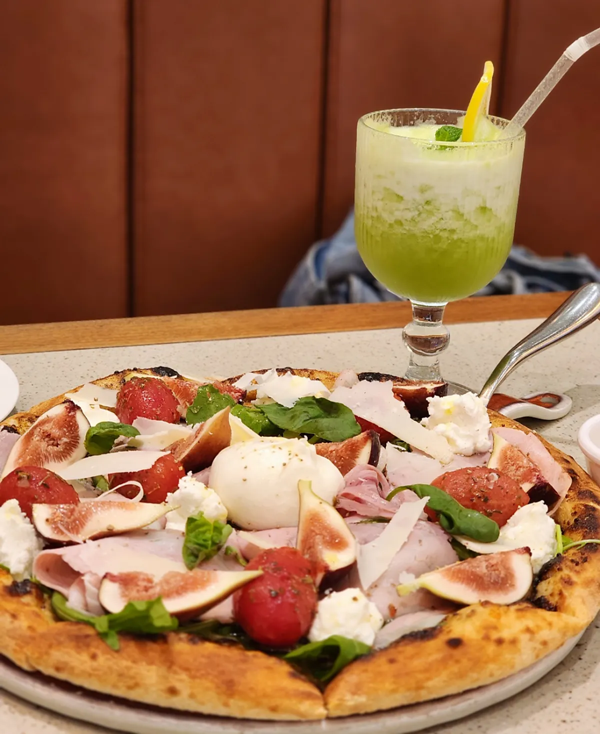 Table set with both the pasta and pizza at Camel Orzo
