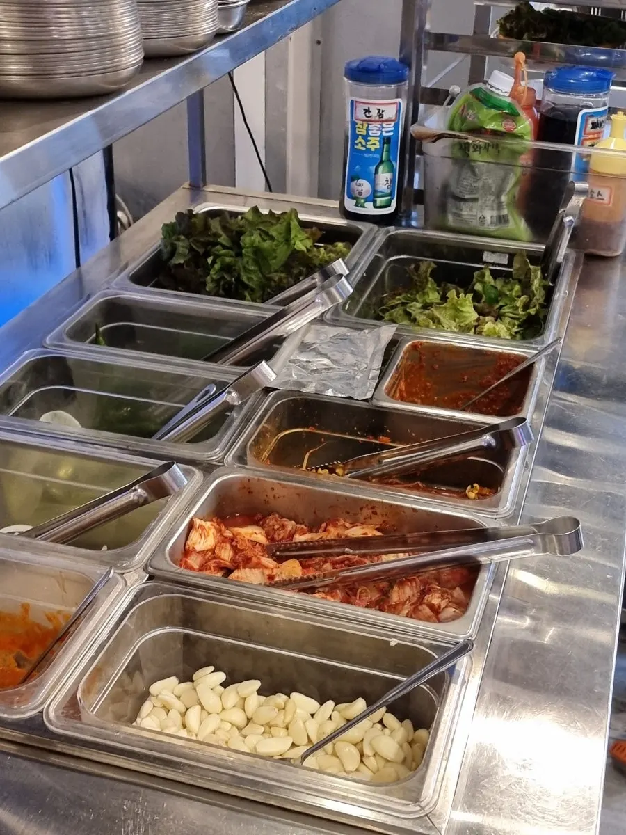 Menu lineup of pork cuts and seafood options