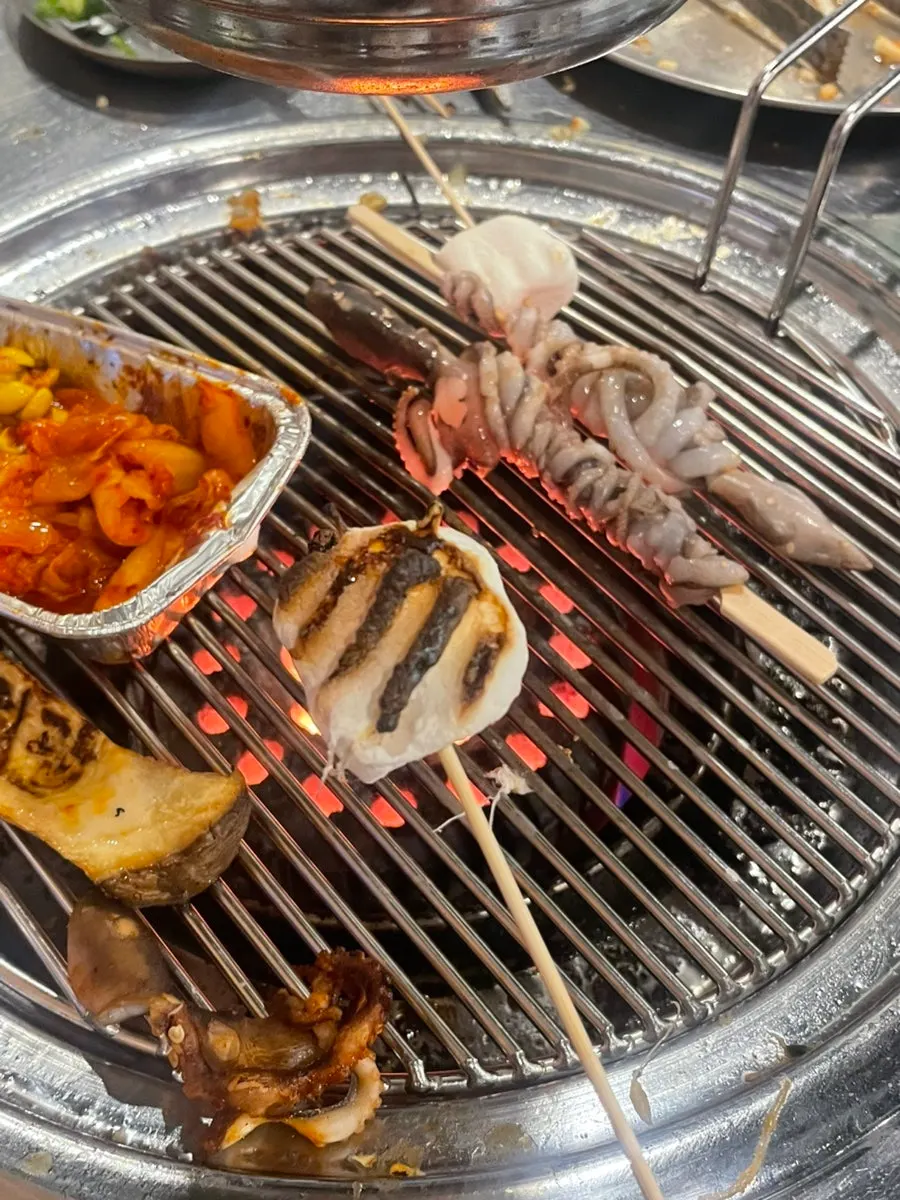 Marshmallow side dish being grilled