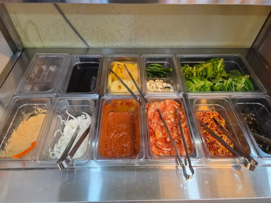 Self-serve bar corner with soybean powder and pineapple