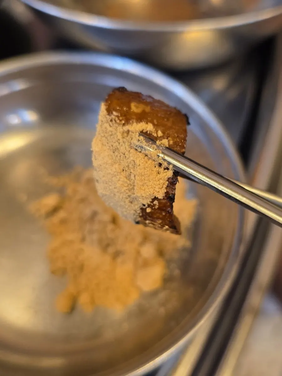 Pork belly skin dipped in soybean powder