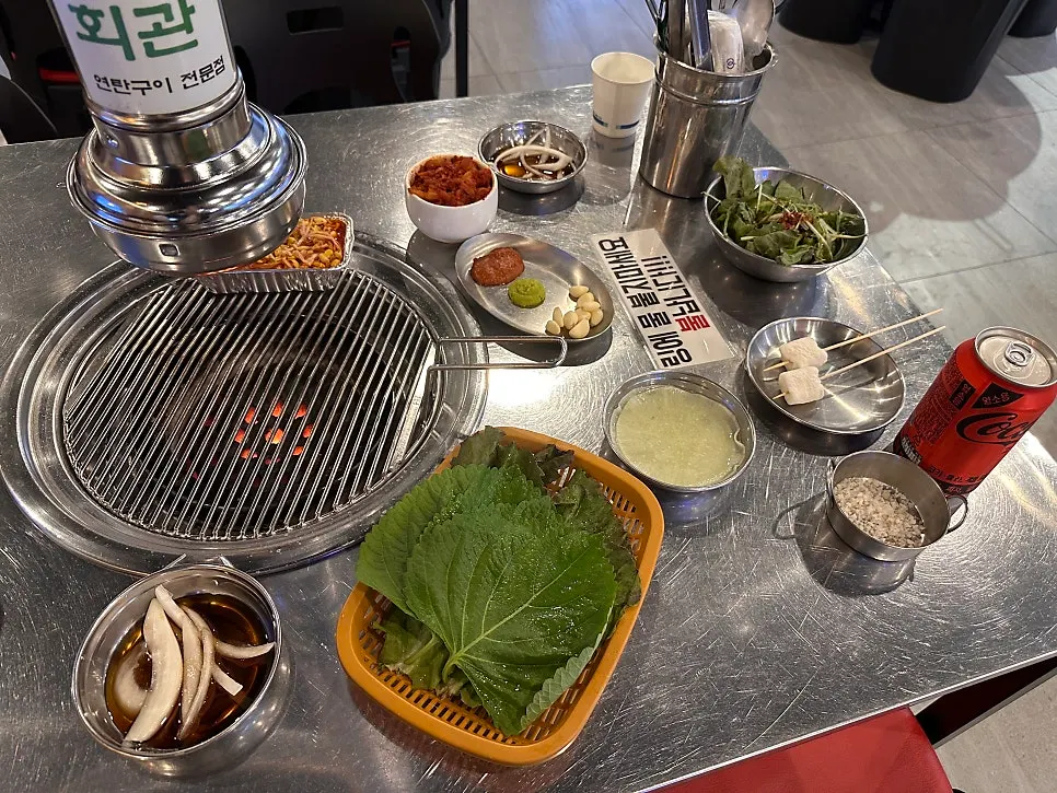 Lit charcoal grill placed on the table