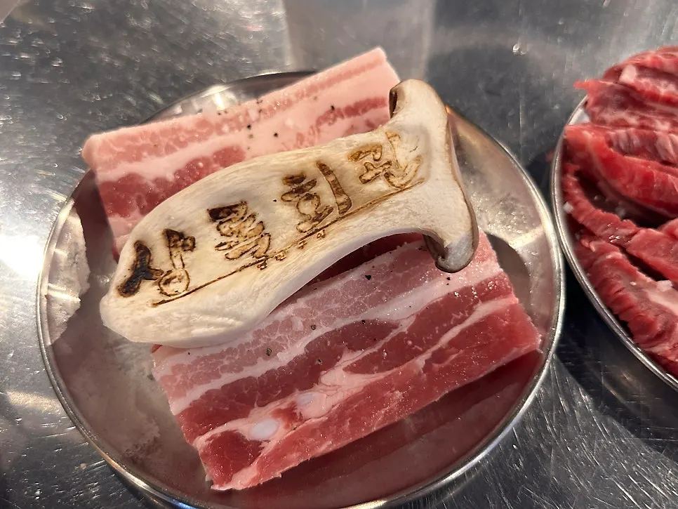 Two thick-cut servings of pork belly