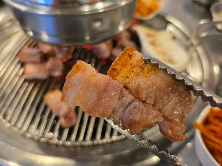 Samgyeopsal and moksal on the charcoal grill