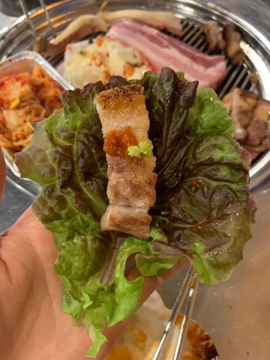 Grilled pork belly with a side dish of salt