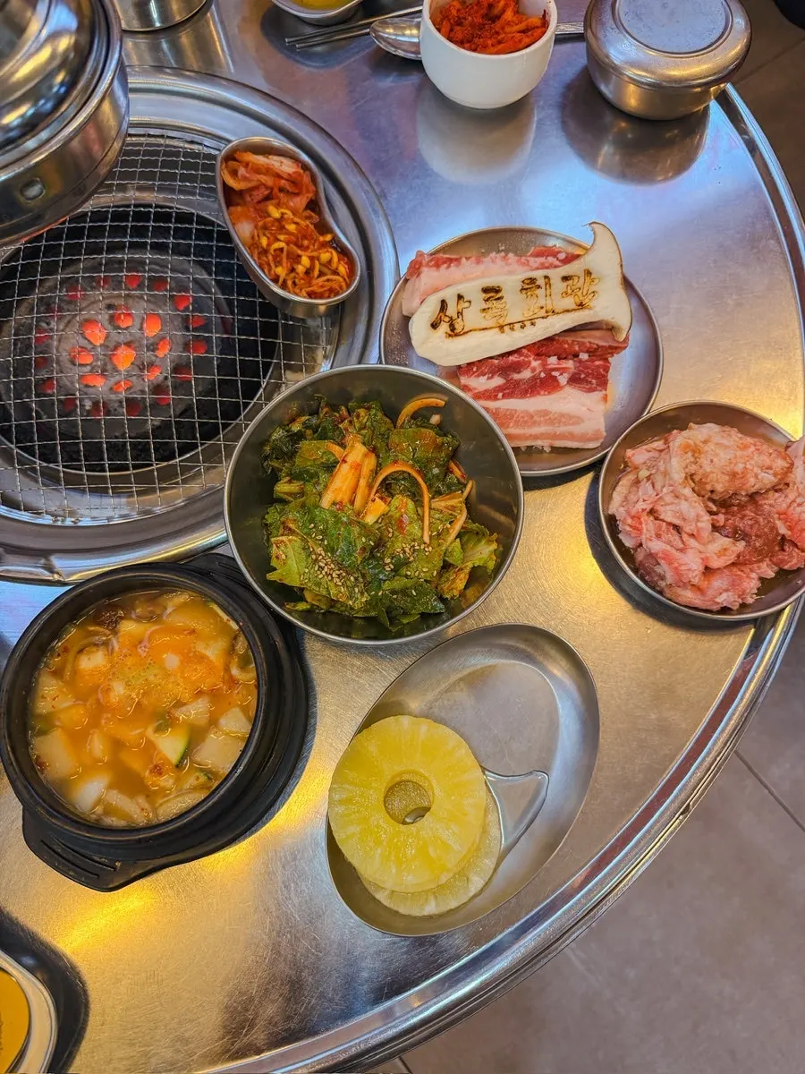 Full spread of ordered meat and side dishes