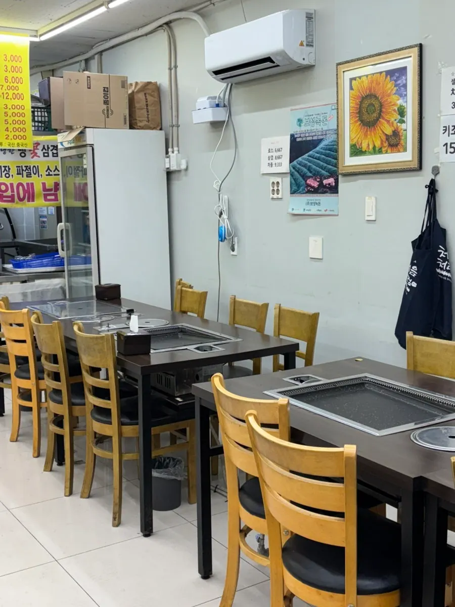 Interior of Myeongmun Restaurant full of customers on a weekday night
