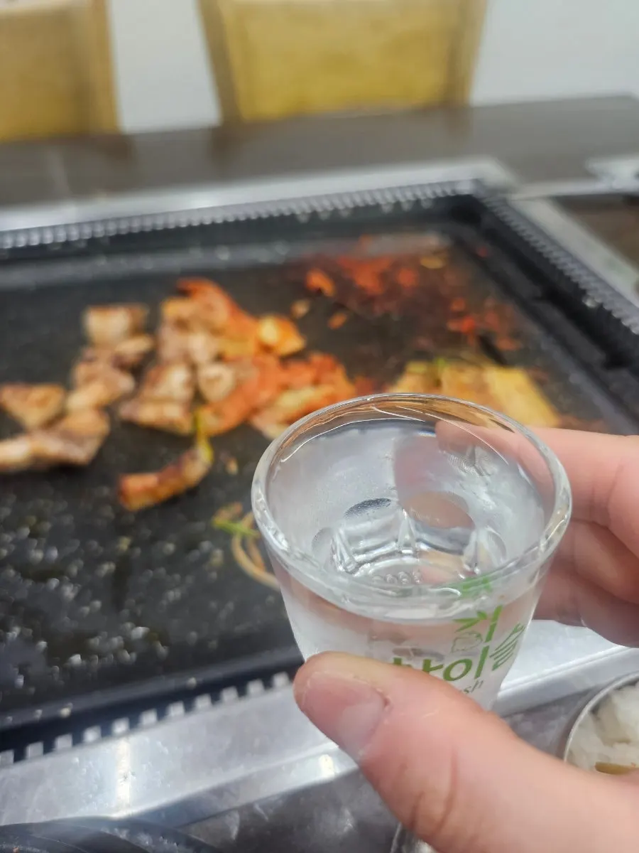 A pork belly meal enjoyed by a group