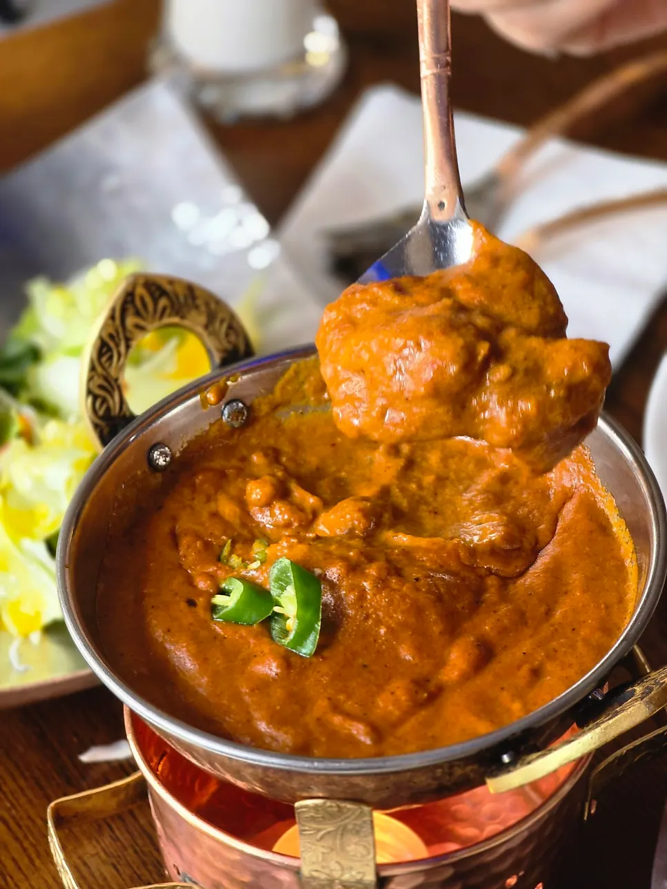 Tomato-and-onion-based chicken masala curry