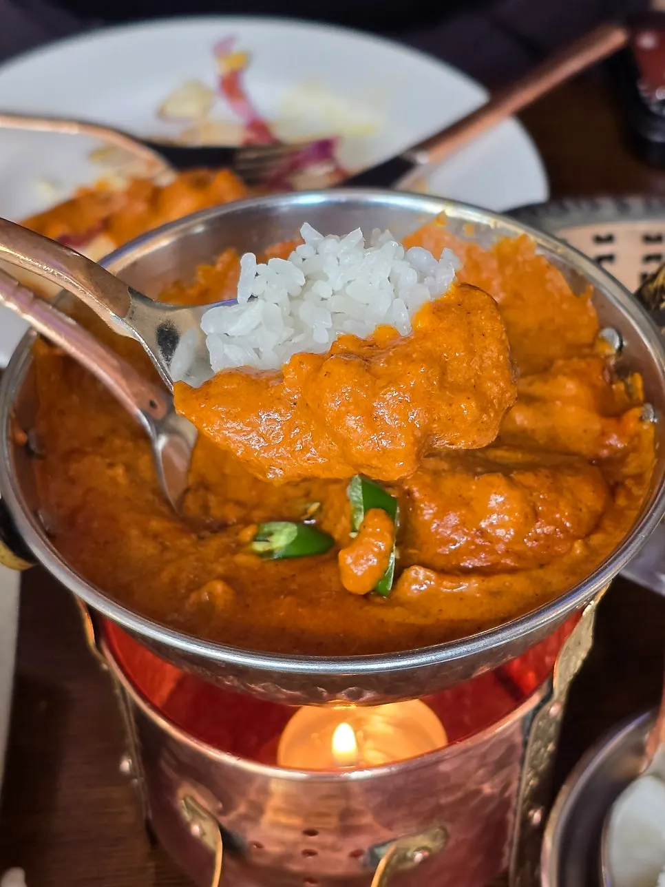 Masala curry with rice and chicken pieces