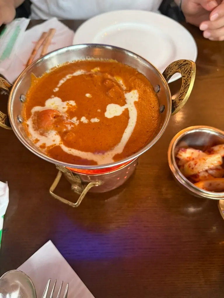 A curry spread with warm naan