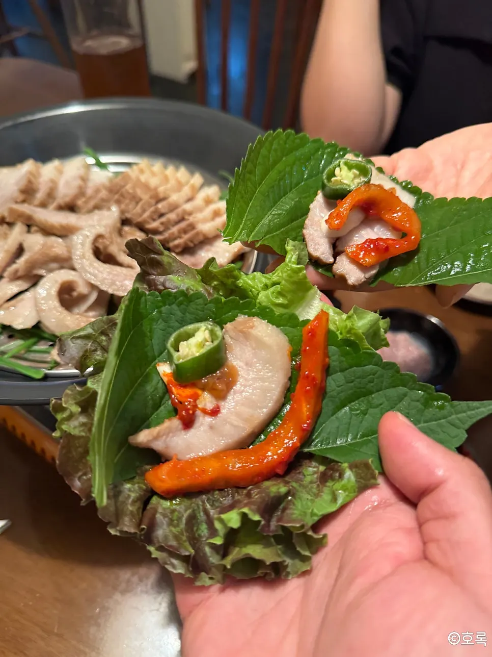 One bite of suyuk wrap