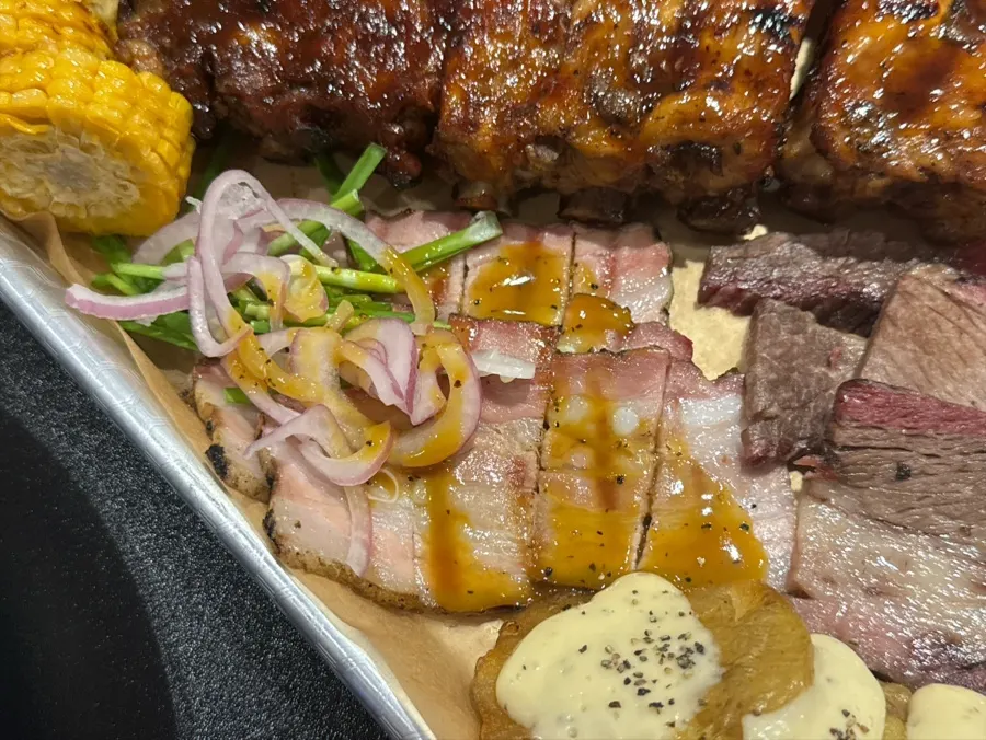 Close-up of smoked brisket and pork belly