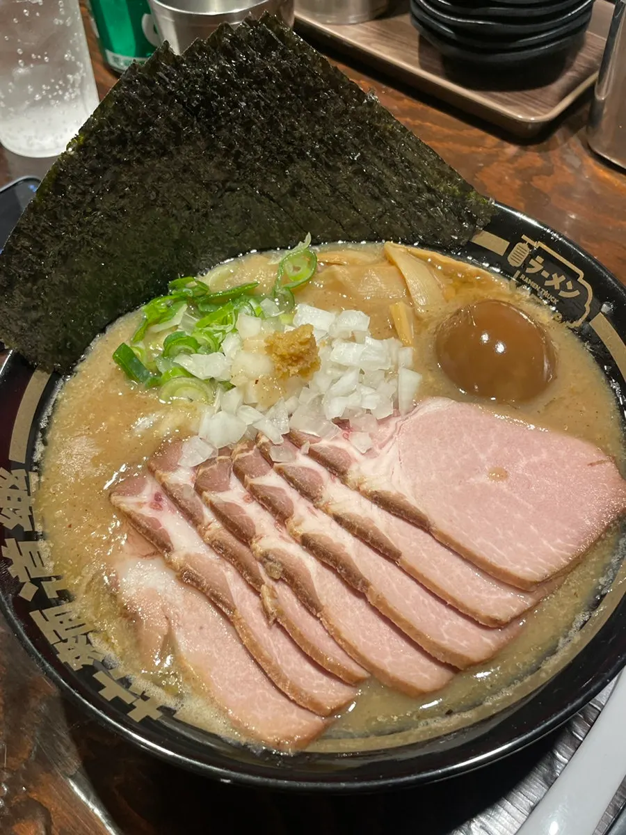 Two bowls of ramen served on the table