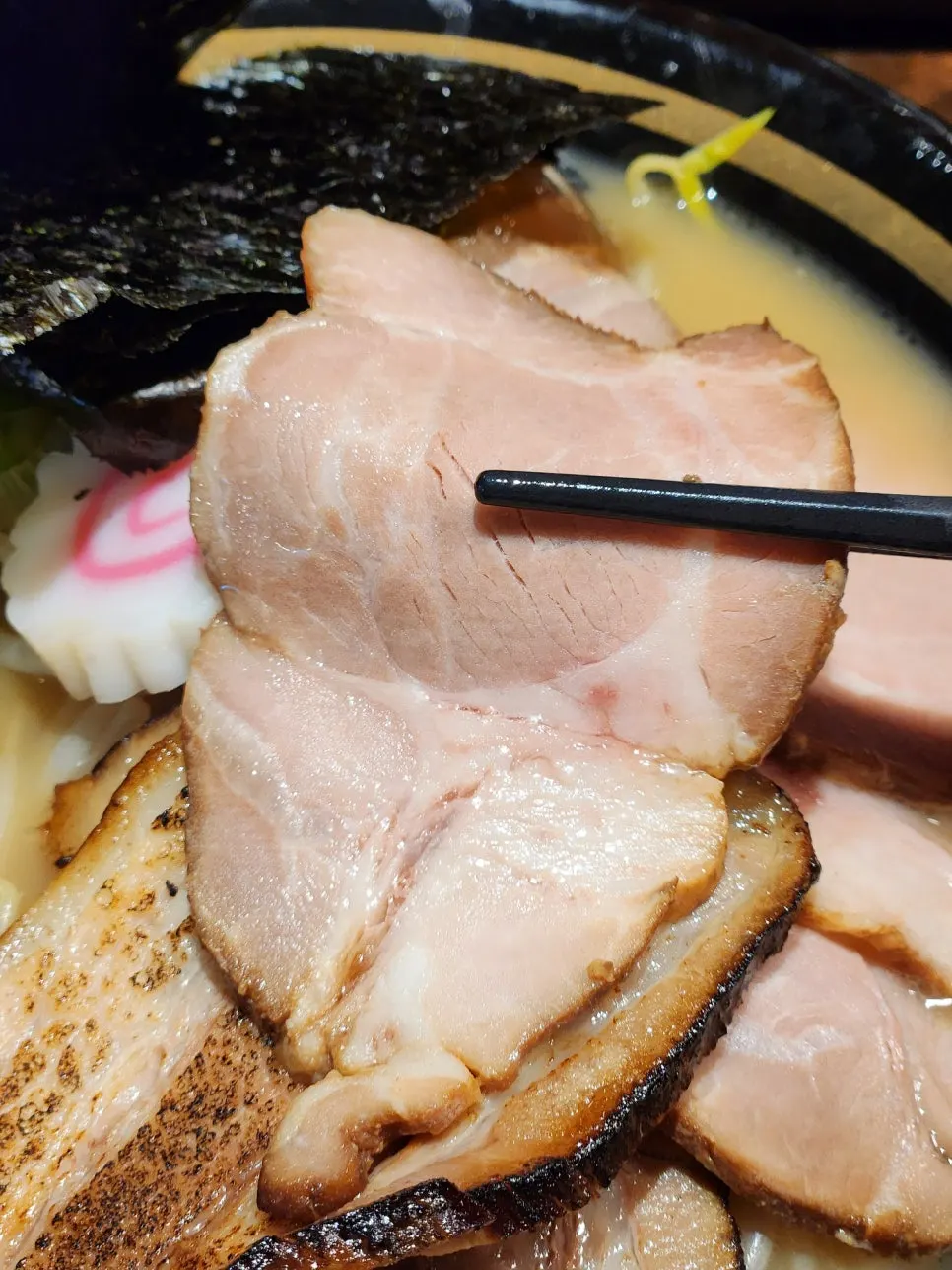 Flame-seared pork belly chashu and sous-vide chashu toppings
