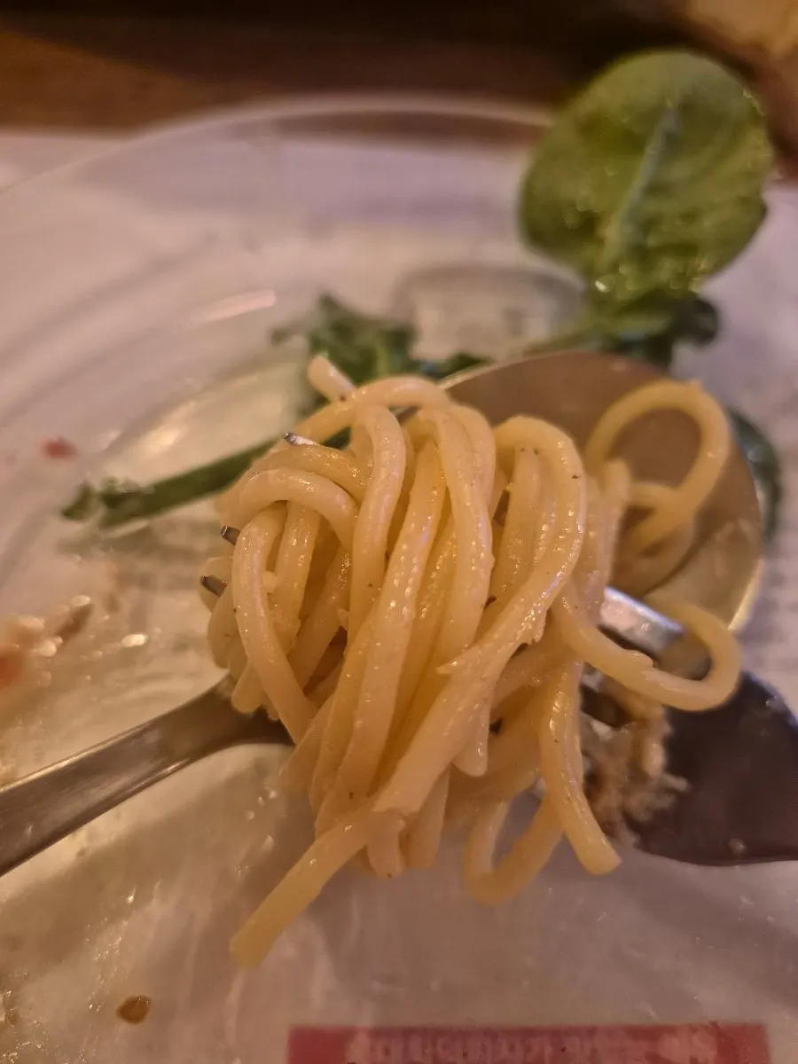 Close-up of rucola oil pasta with shrimp