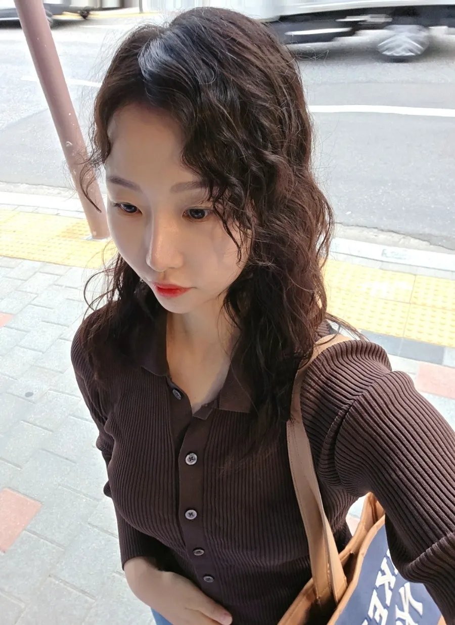 Hippie-perm curls on the day after the appointment