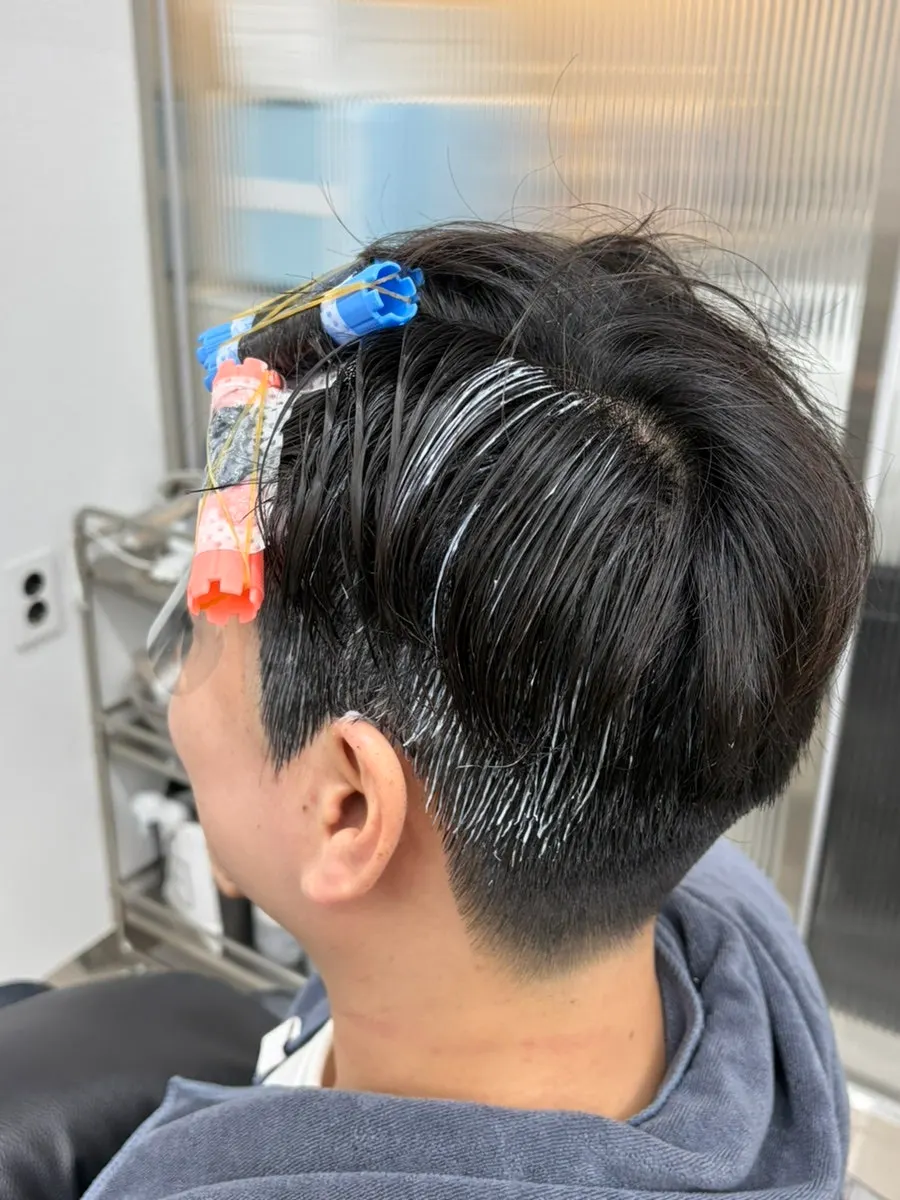 Men's hair looking neat after the cut