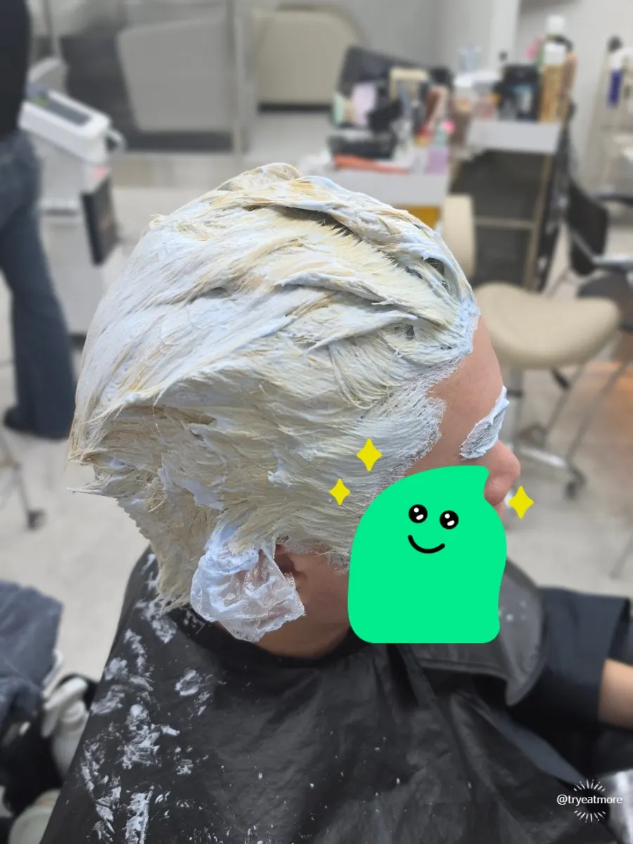First round of bleach fully applied to the whole head